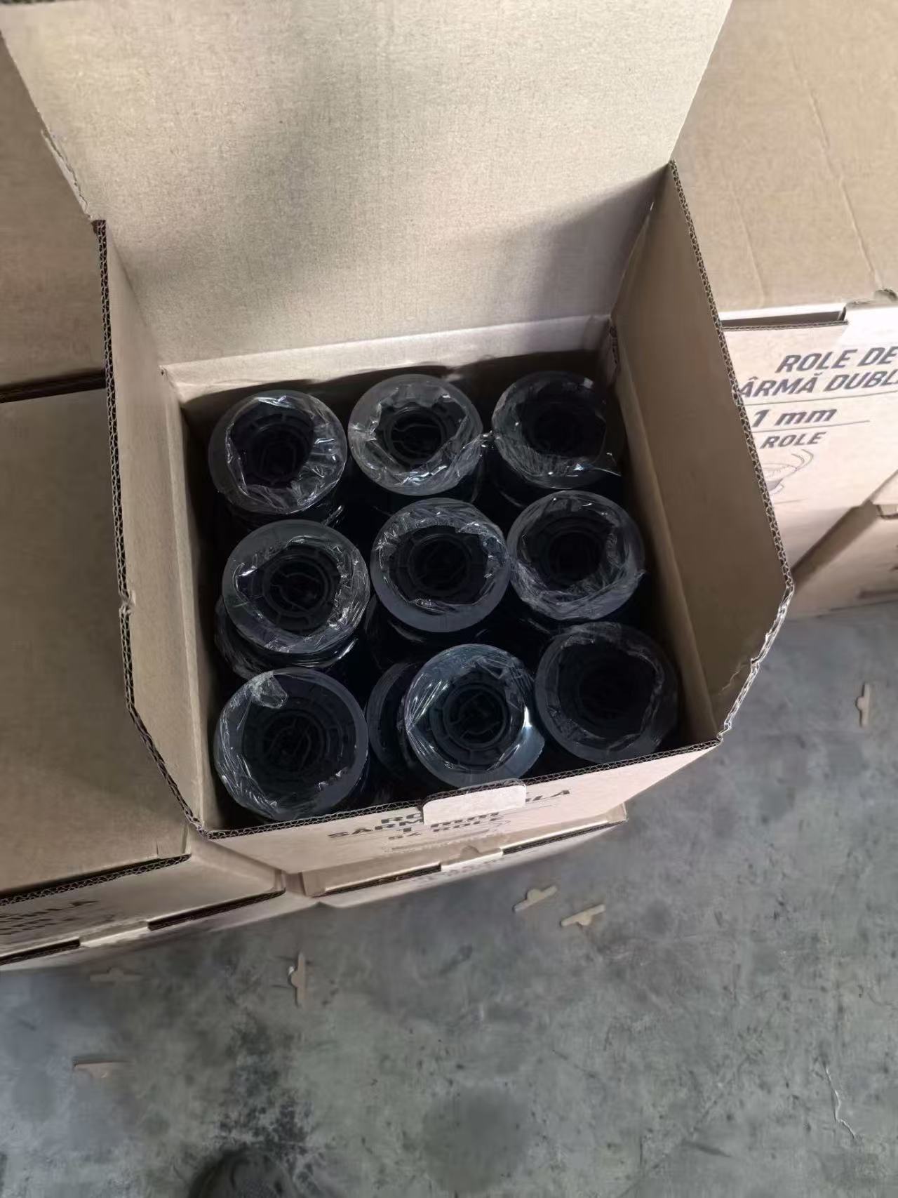 The wire coils are neatly arranged in customer-customized cartons.