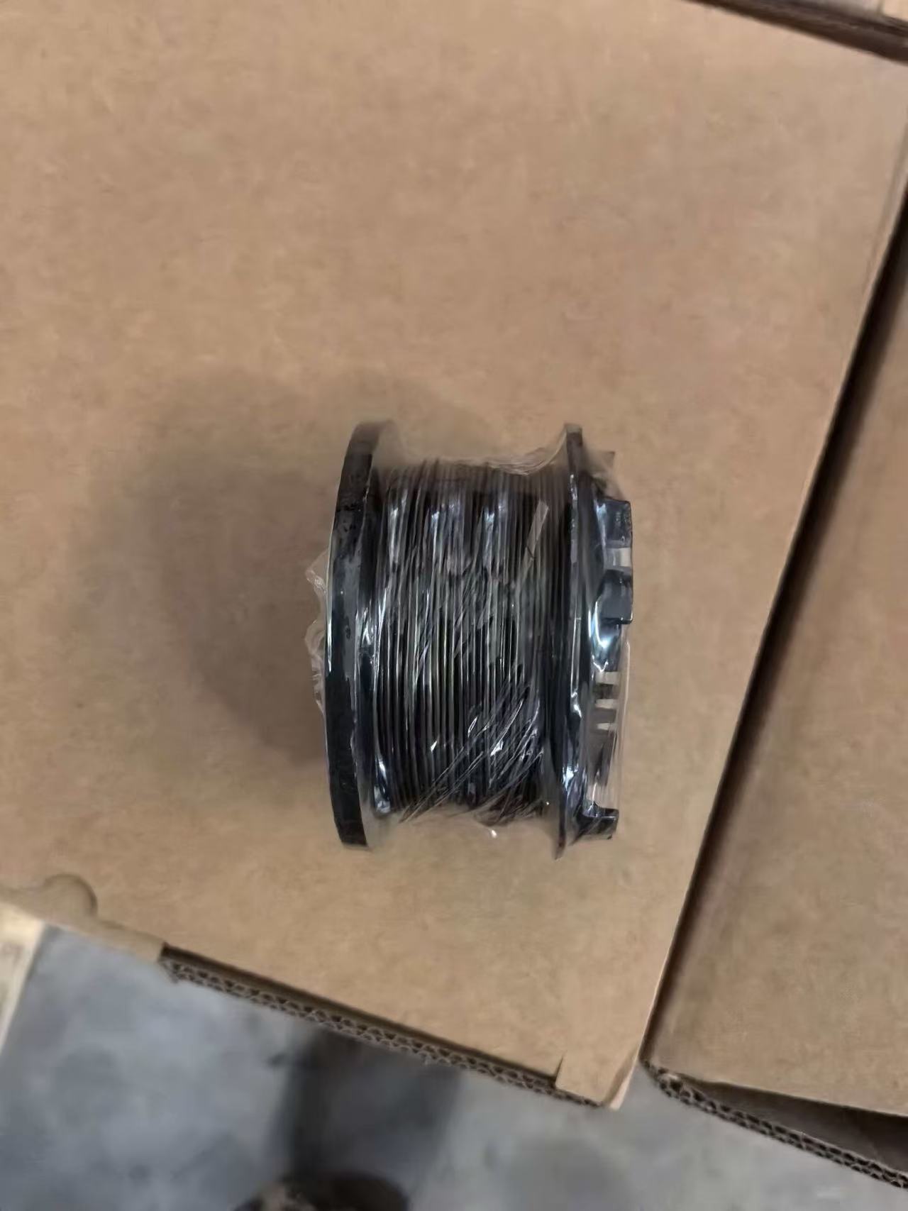 Each coil is tightly wrapped with stretch film to prevent scratches.